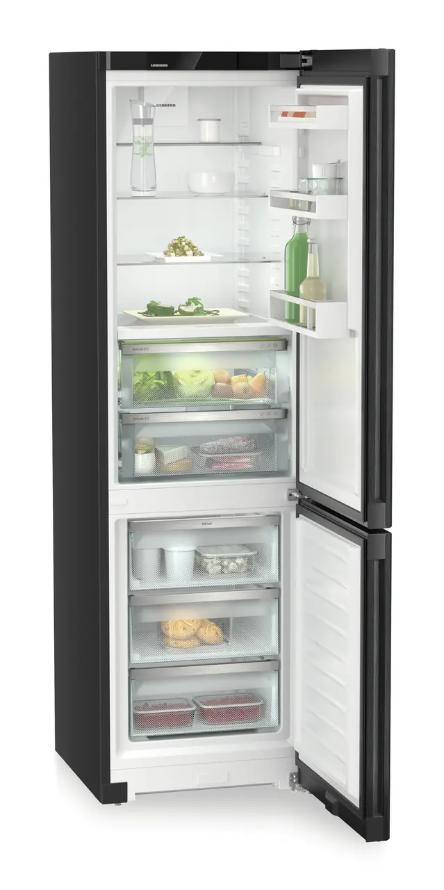 Product image, Perspective: oblique open decorated, Fridge-freezer with BioFresh and NoFrost, Casing colour: black, Door colour: BlackSteel