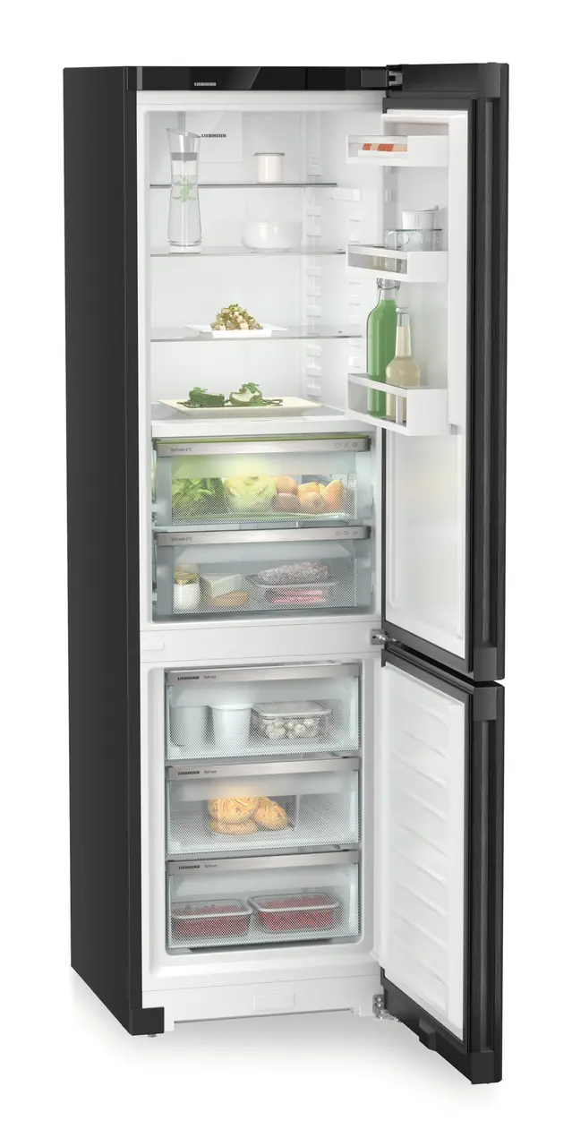 Product image, Perspective: oblique open decorated, Fridge-freezer with BioFresh and NoFrost, Casing colour: black, Door colour: BlackSteel